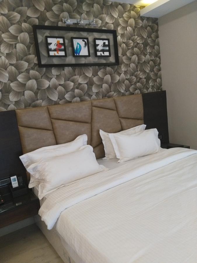 Golden Tree Hotel Puri Luaran gambar