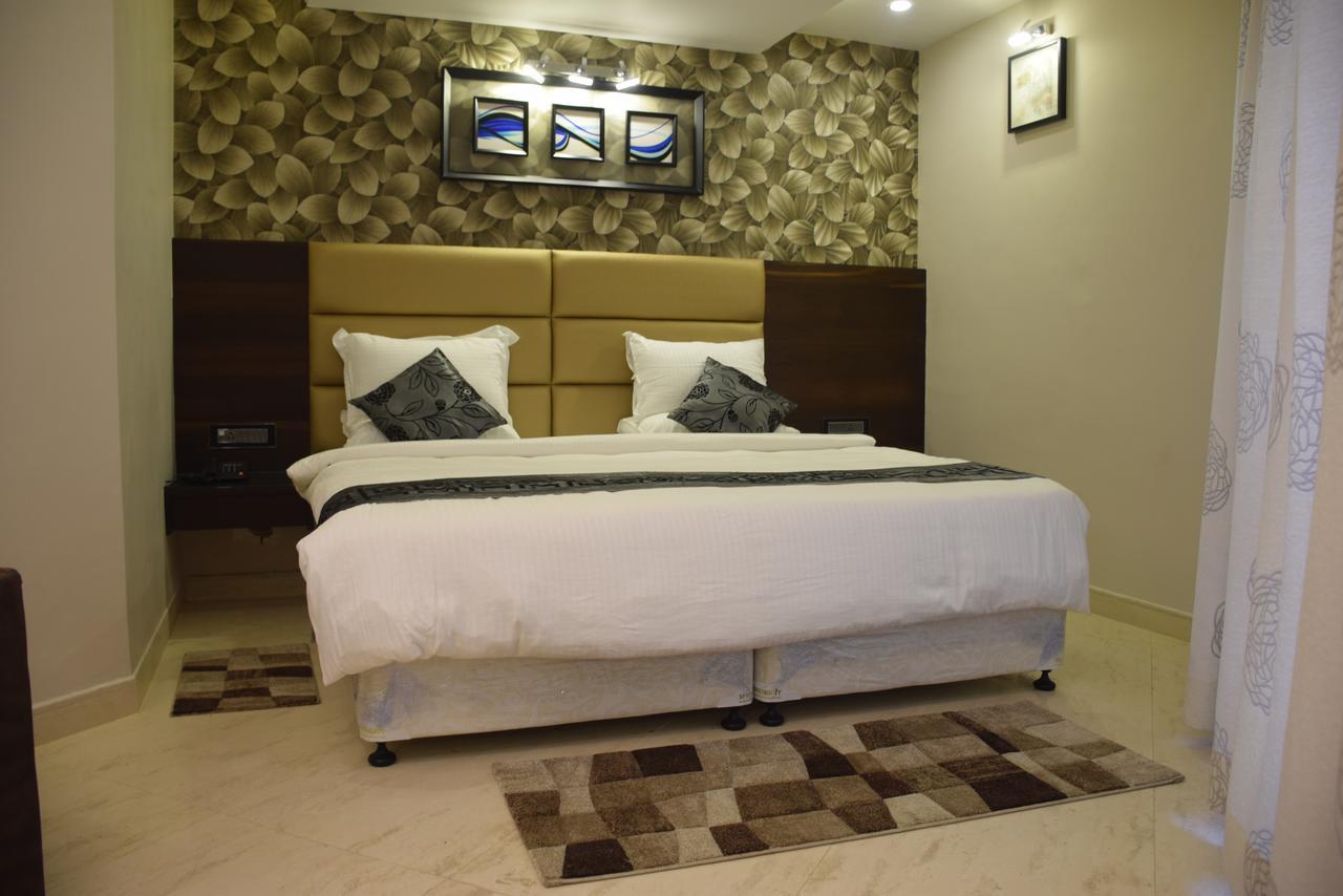 Golden Tree Hotel Puri Luaran gambar